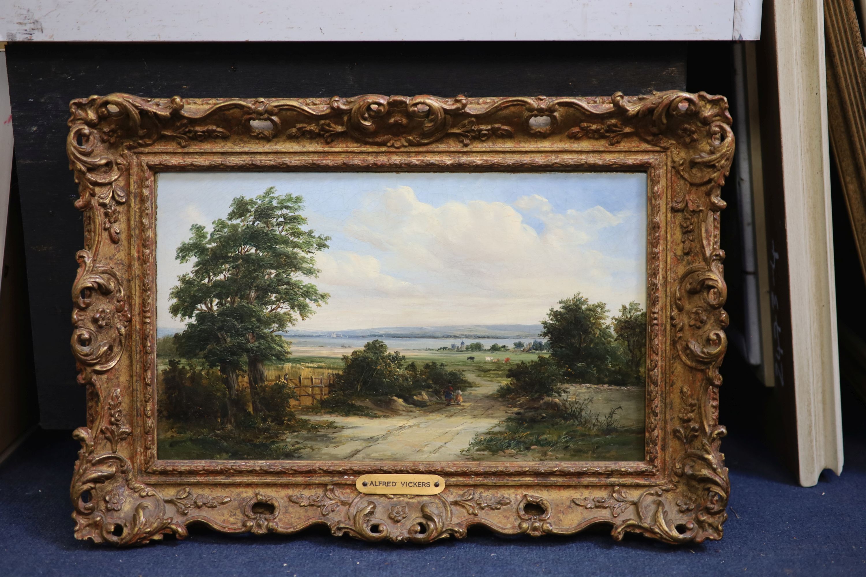 Alfred Vickers (1786-1868), Extensive landscape with figures on a lane looking towards an estuary, oil on canvas, 22 x 37cm